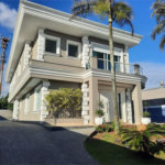Casa com 6 dormitórios à venda, 700 m² por R$ 10.000.000,00 - Loteamento João Batista Julião - Guarujá/SP