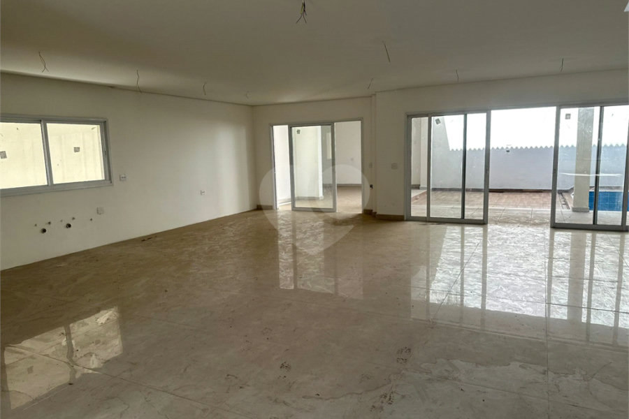 Casa à venda com 4 suítes no condomínio Villaggio Houda, São Paulo - SP