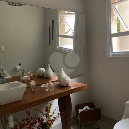 Casa à venda com 4 suítes no condomínio Granja Morumbi, São Paulo - SP