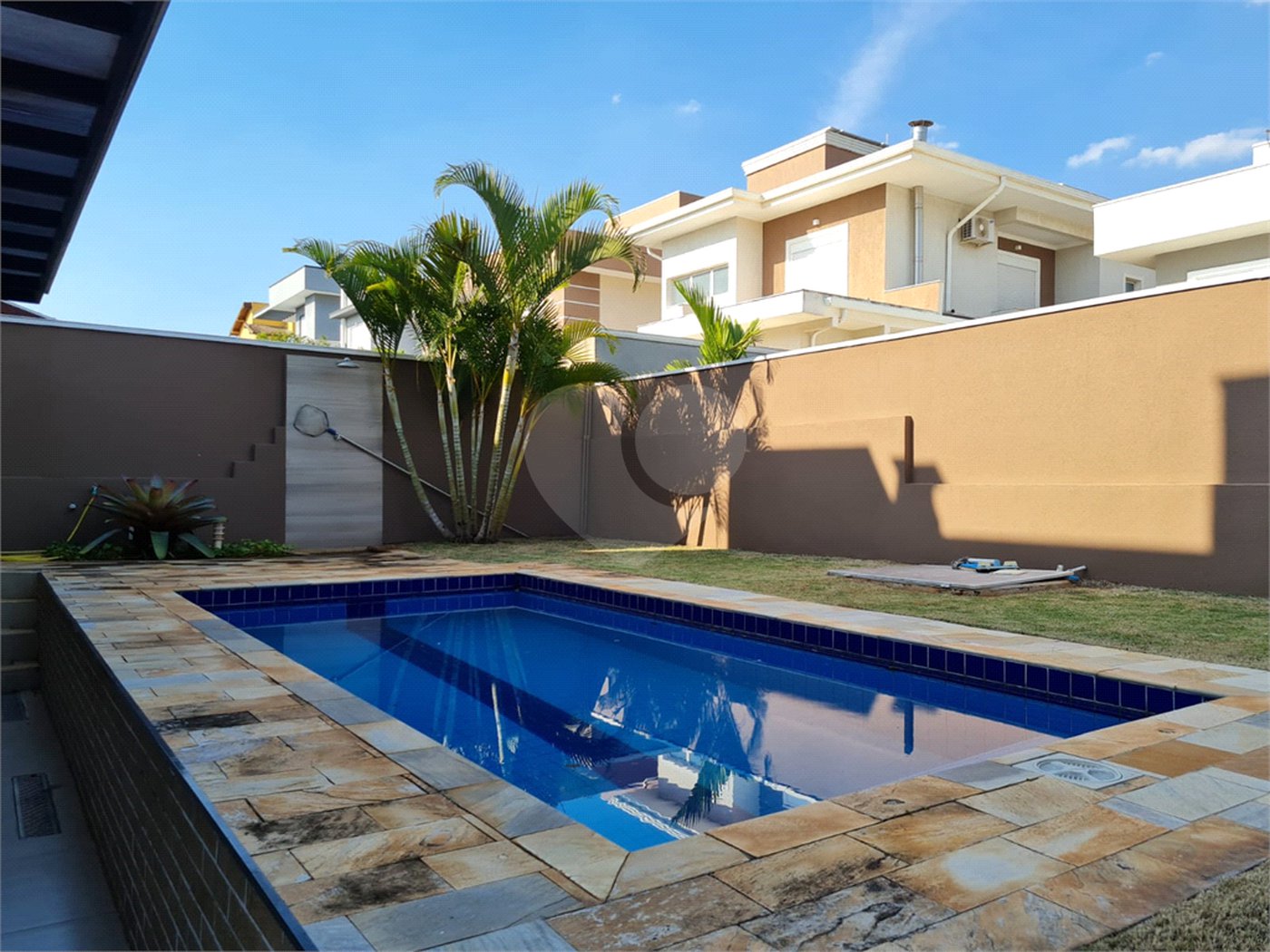 Casa à venda com 3 suítes no condomínio Geneve, Campinas - SP