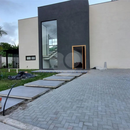 Casa à venda com 4 suítes no condomínio Park Lane, Guarujá - SP