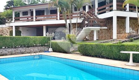 Casa à venda com 4 suítes no condomínio Alpes da Cantareira, Mairiporã - SP