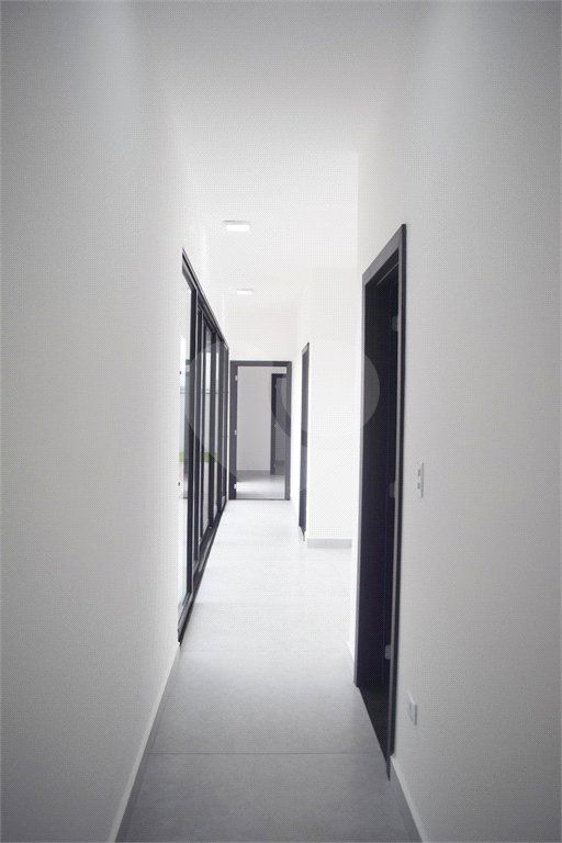 Casa à venda com 4 suítes no condomínio Figueira Garden, Atibaia - SP