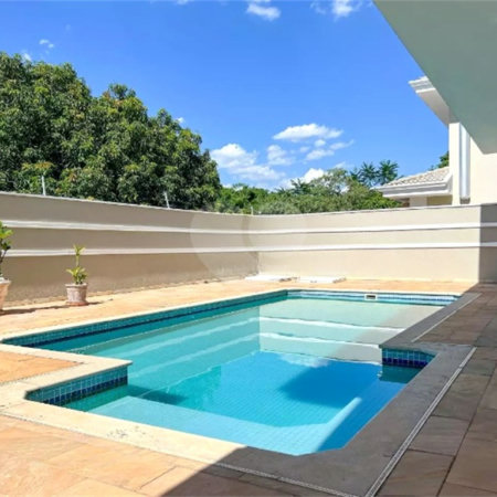 Casa à venda com 3 suítes no condomínio Portal do Lago, Valinhos - SP