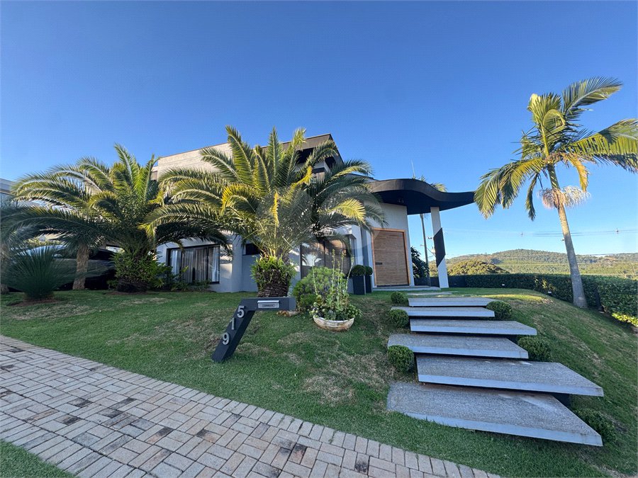 Casa à venda ou para alugar com 4 suítes no condomínio Campo de Toscana, Vinhedo - SP