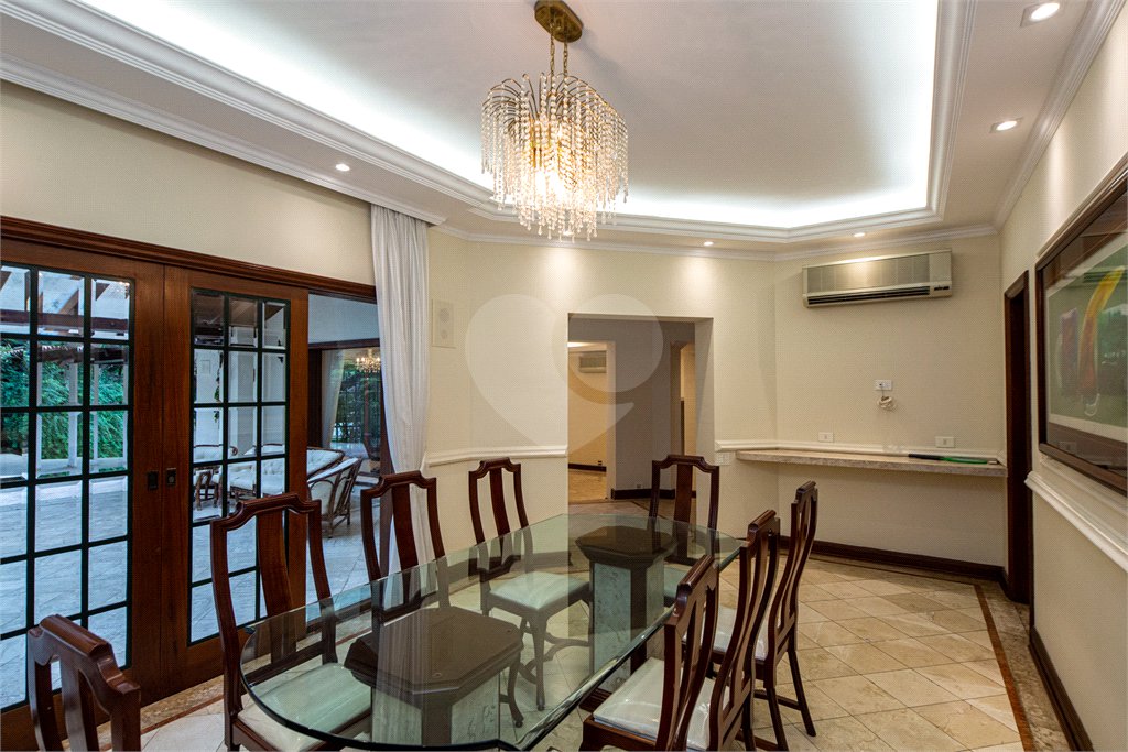 Casa à venda com 4 suítes no condomínio Chácara Flora, São Paulo - SP