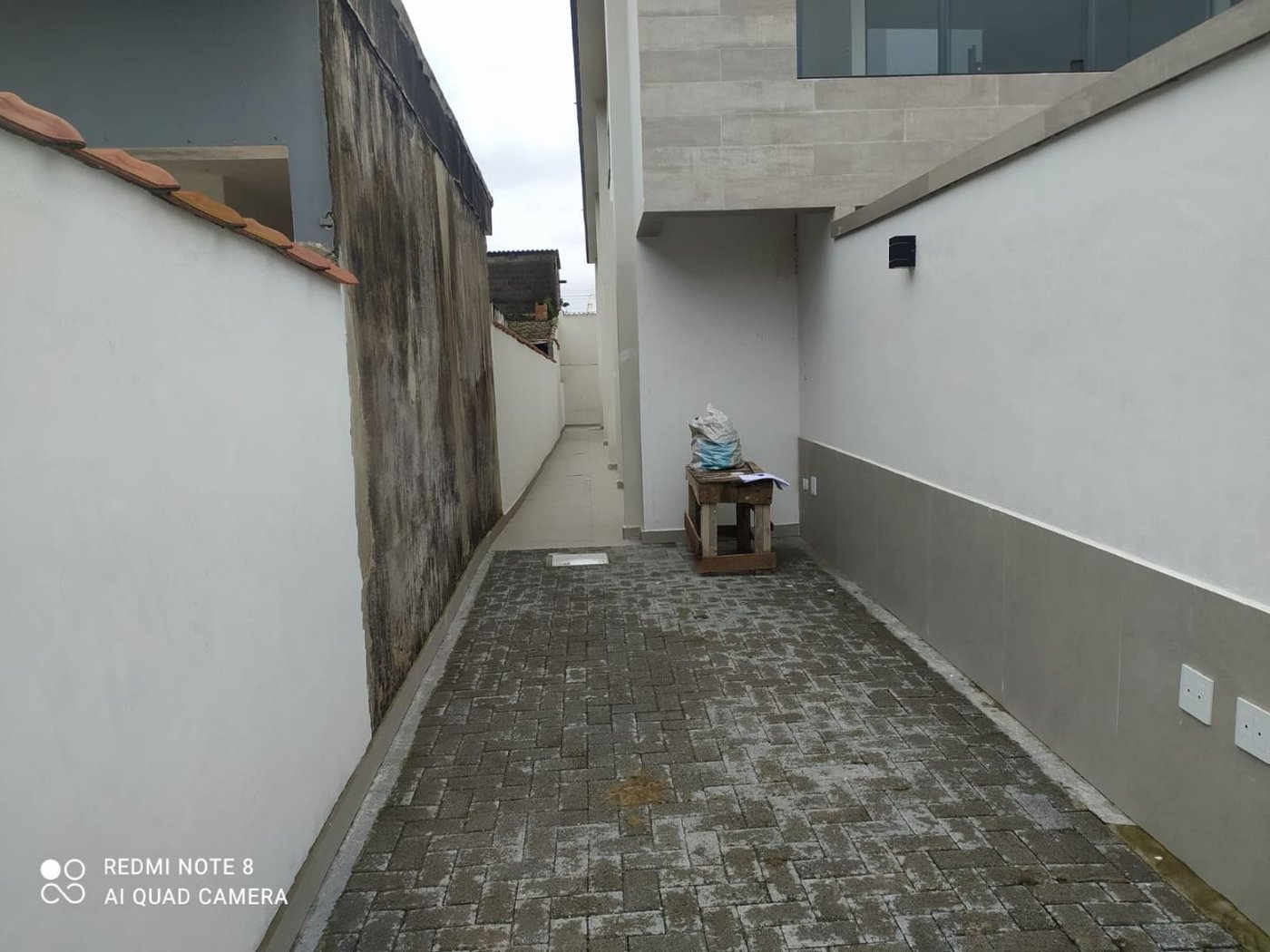 Sobrado com 3 dormitórios à venda, 107 m² por R$ 825.000,00 - Estuário - Santos/SP