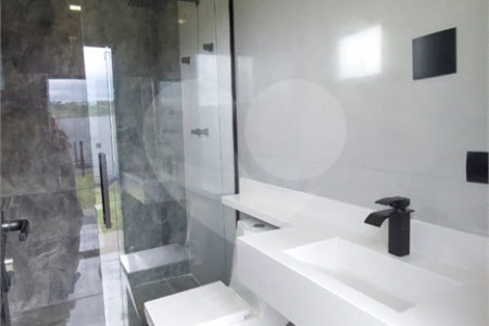 Casa à venda com 5 suítes no condomínio Figueira Garden, Atibaia - SP