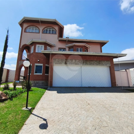 Casa à venda ou para alugar com 3 suítes no condomínio Estância Marambaia, Vinhedo - SP