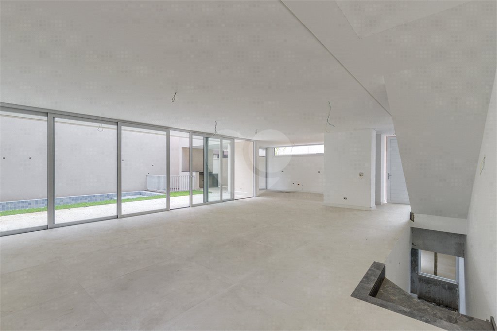 Casa à venda com 4 suítes no condomínio Garda, São Paulo - SP