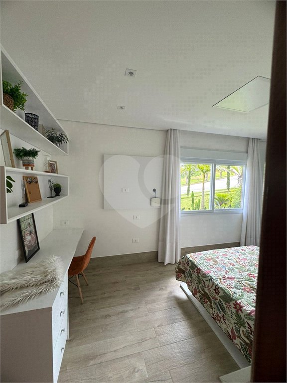 Casa à venda com 4 suítes no condomínio Itaporã, Atibaia - SP