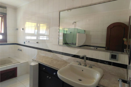 Casa à venda com 4 suítes no condomínio Ville Bourghese, São Paulo - SP