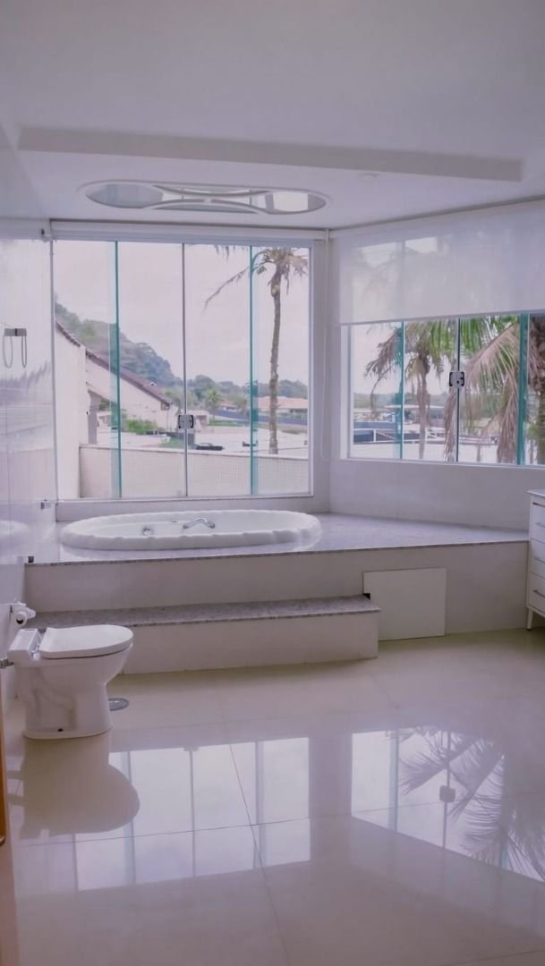 Casa com 5 dormitórios à venda, 900 m² por R$ 15.200.000,00 - Cidade Jardim Tom - Guarujá/SP