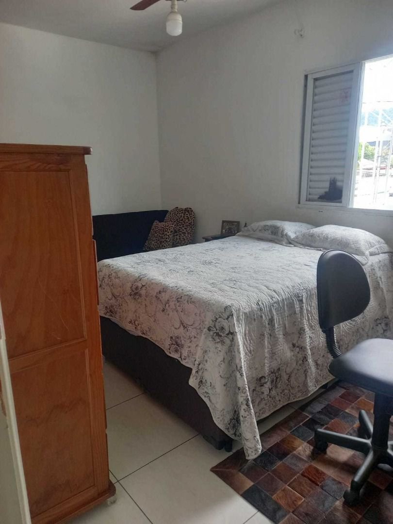 Casa com 3 dormitórios à venda, 110 m² por R$ 590.000,00 - Jardim Paraíso - São Vicente/SP