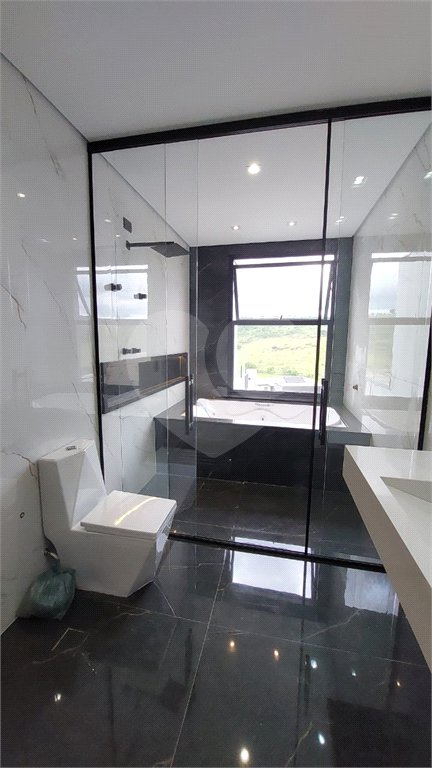 Casa à venda com 5 suítes no condomínio Figueira Garden, Atibaia - SP