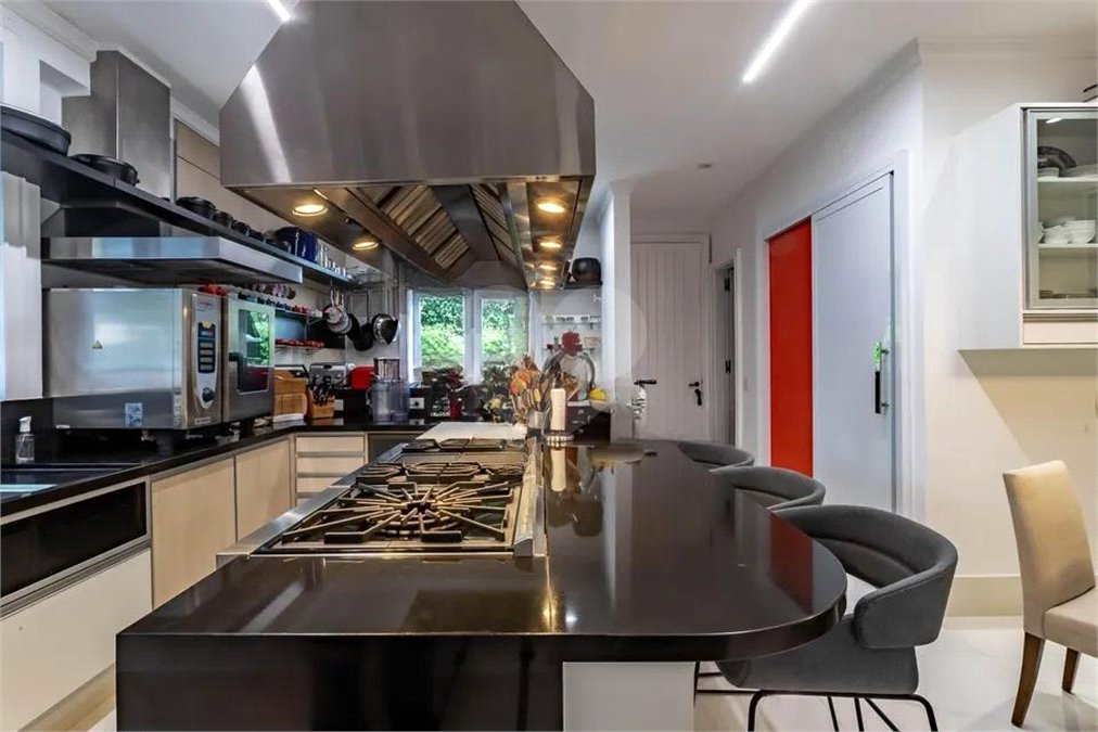 Casa à venda com 4 suítes no condomínio Ville D´asolo, São Paulo - SP