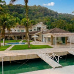 Casa com 5 dormitórios à venda, 900 m² por R$ 15.200.000,00 - Cidade Jardim Tom - Guarujá/SP