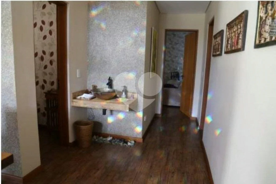 Casa à venda com 4 suítes no condomínio Suíça da Cantareira, Mairiporã - SP