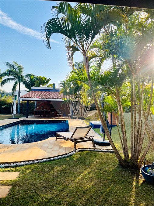 Casa à venda com 4 suítes no condomínio Residencial Vale das Laranjeiras, Indaiatuba - SP
