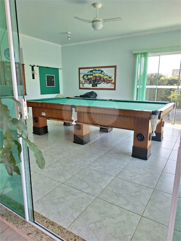 Casa à venda com 4 suítes no condomínio Bougainville, Peruíbe - SP