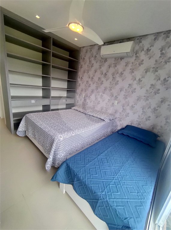 Casa à venda ou para alugar com 4 suítes no condomínio Sambaqui, São Sebastião - SP