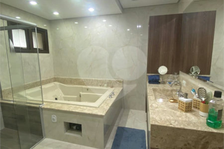 Casa à venda com 4 suítes no condomínio Vale da Santa Fé, Vinhedo - SP