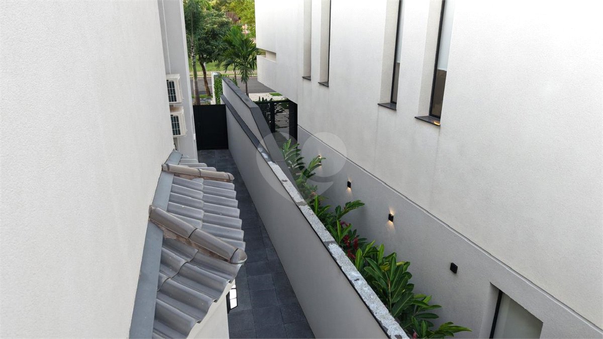 Casa à venda com 4 suítes no condomínio Alphaville Dom Pedro 3, Campinas - SP