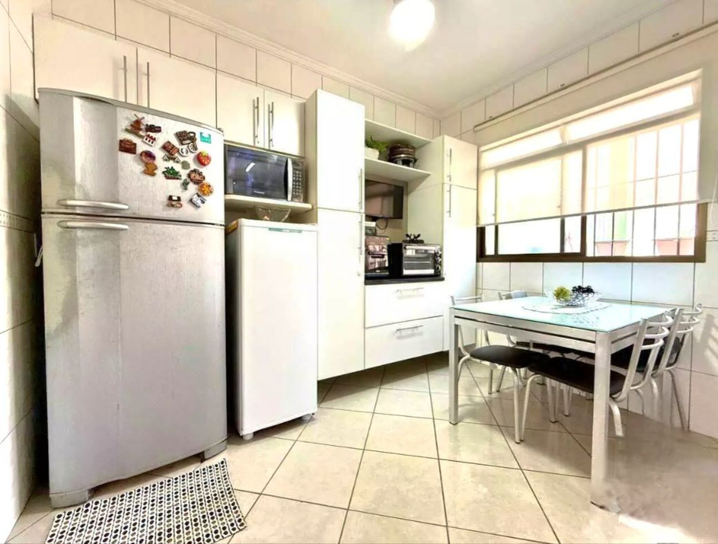 Casa com 3 dormitórios à venda, 159 m² por R$ 1.380.000,00 - Embaré - Santos/SP