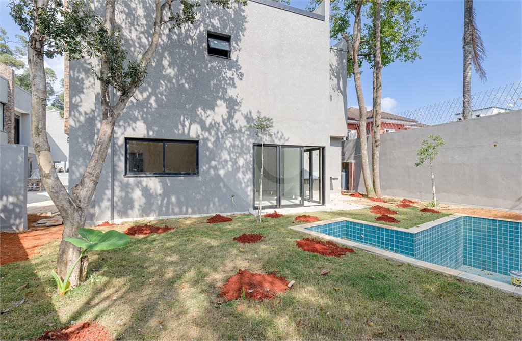 Casa à venda com 4 suítes no condomínio Reserva Robélia, São Paulo - SP