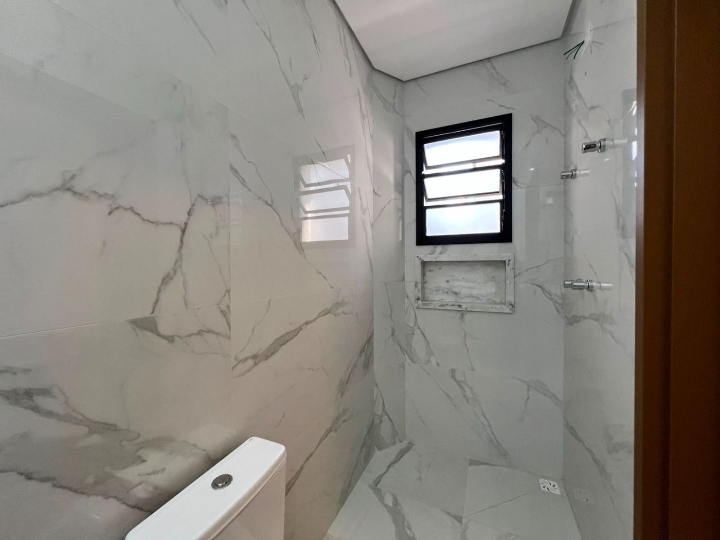 Sobrado com 4 dormitórios à venda, 234 m² por R$ 2.500.000,00 - Ponta da Praia - Santos/SP