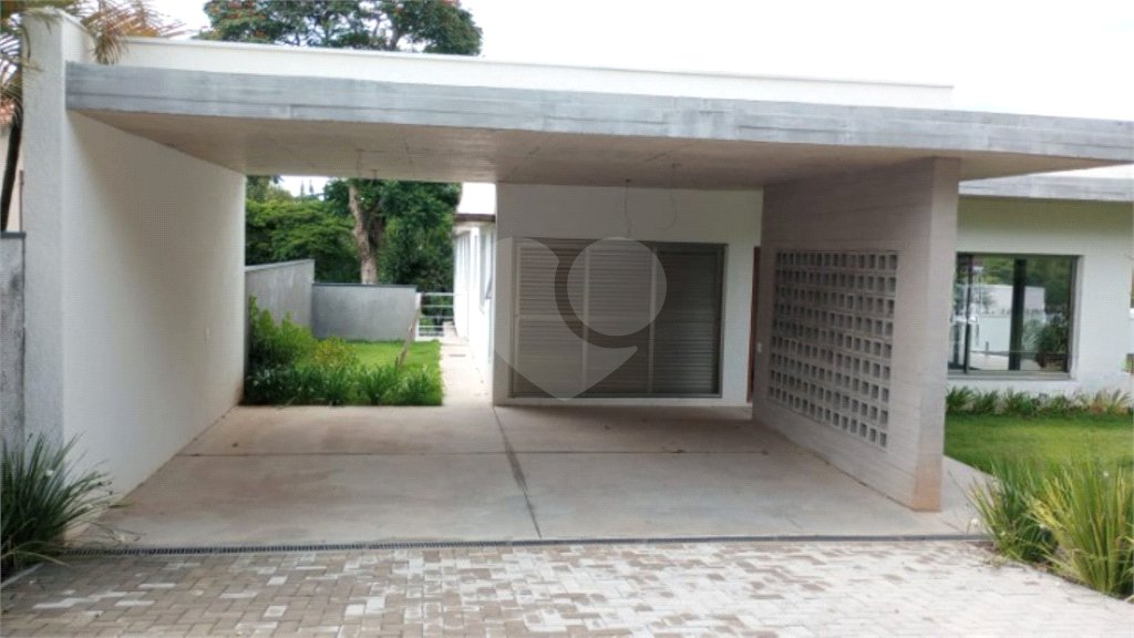 Casa à venda com 4 suítes no condomínio Estância Marambaia, Vinhedo - SP