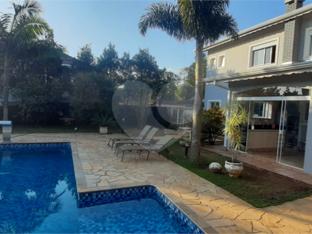 Casa à venda com 4 suítes no condomínio Suíça da Cantareira, Mairiporã - SP