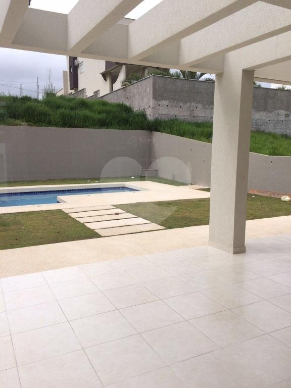Casa à venda com 4 suítes no condomínio Santa Maria, Cotia - SP