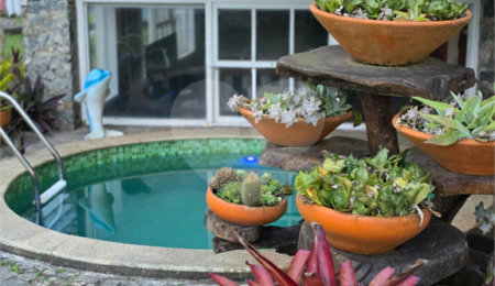 Casa em condomínio à venda com 5 quartos, sendo 1 suíte,  em Praia Rasa, Armação dos Búzios, RJ