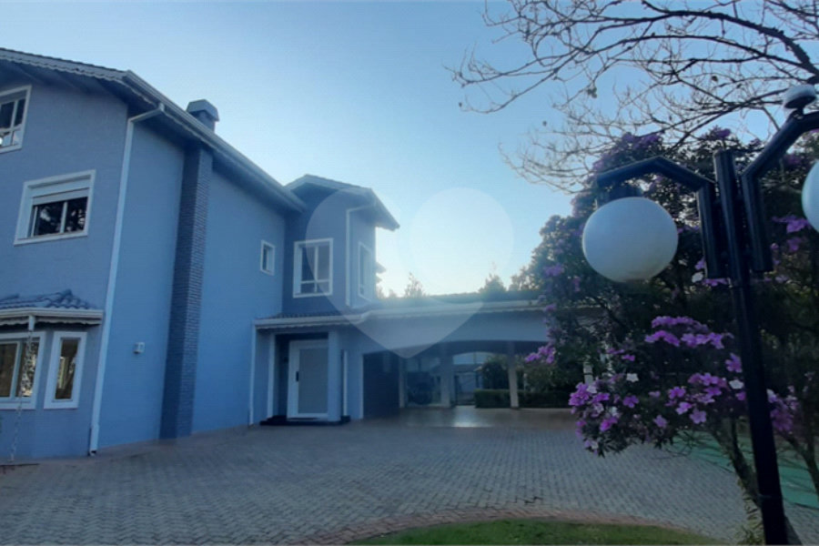 Casa à venda com 4 suítes no condomínio Suíça da Cantareira, Mairiporã - SP