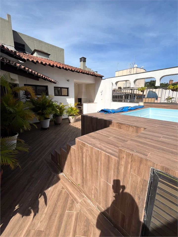 Apartamento com 4 dormitórios à venda, 259 m² por R$ 900.000,00 - Jardim Três Marias - Guarujá/SP