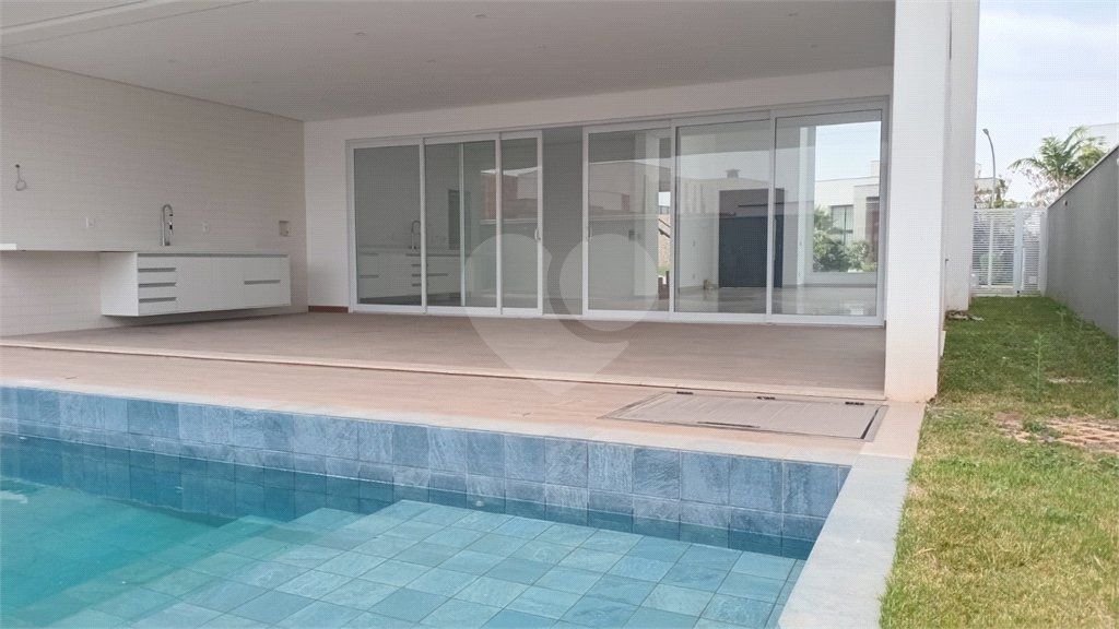 Casa à venda com 5 suítes no condomínio Alphaville Nova Esplanada 1, Votorantim - SP