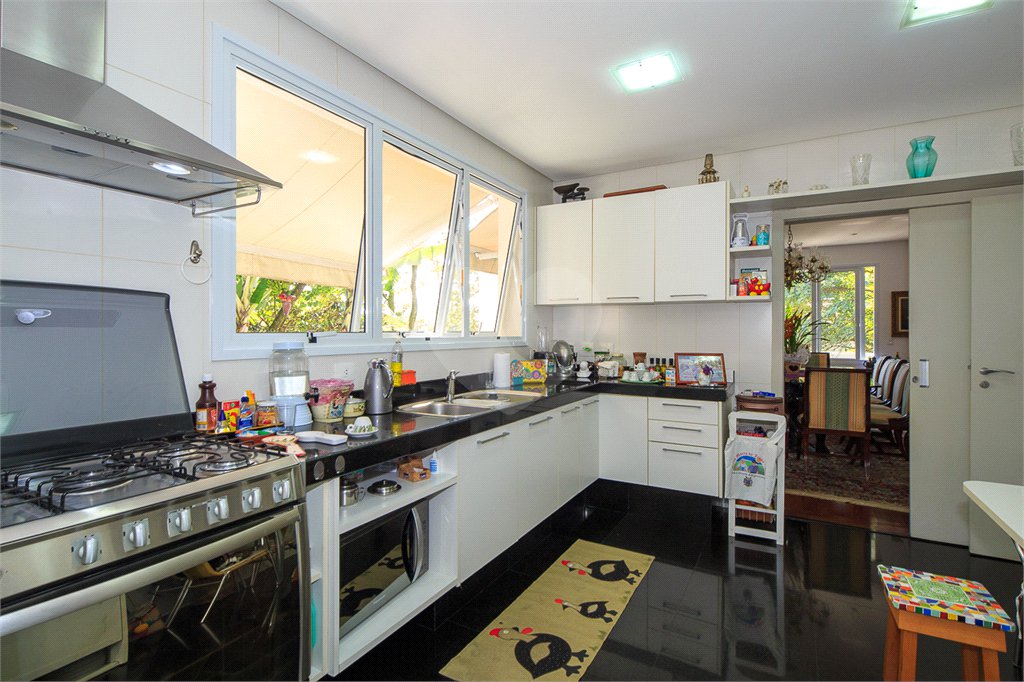 Casa à venda com 4 suítes no condomínio Vila Alba, São Paulo - SP