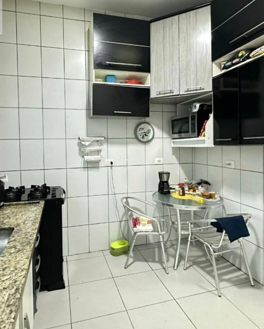 Casa com 3 dormitórios à venda, 120 m² por R$ 800.000,00 - Campo Grande - Santos/SP