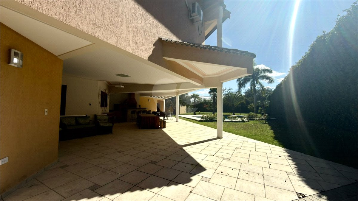 Casa à venda com 4 suítes no condomínio Parque Village Castelo, Itu - SP
