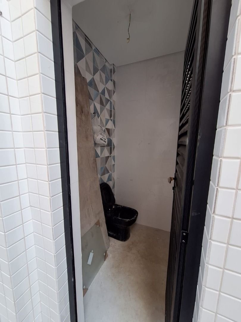 Casa com 3 dormitórios à venda, 140 m² por R$ 1.580.000,00 - Ponta da Praia - Santos/SP