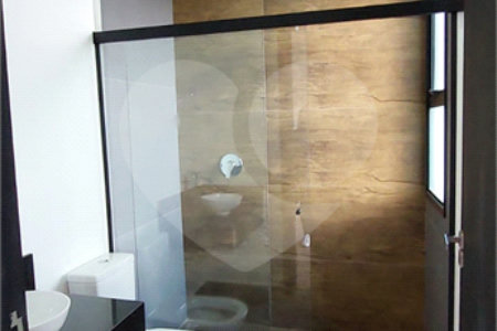 Casa à venda com 4 suítes no condomínio Figueira Garden, Atibaia - SP