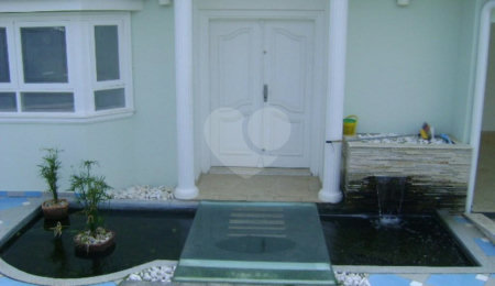 Casa à venda com 3 suítes no condomínio Estância Marambaia, Vinhedo - SP