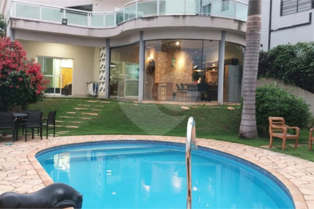 Casa para alugar com 4 quartos, sendo 3 suítes,  no condomínio Figueira Garden, Atibaia - SP