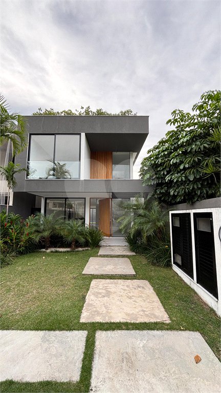 Casa à venda com 4 suítes no condomínio Riomar X, Rio de Janeiro - RJ