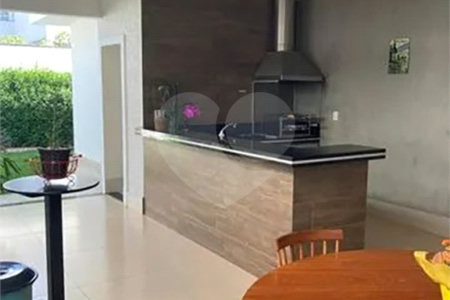 Casa à venda com 3 suítes no condomínio Terras do Cancioneiro, Paulínia - SP