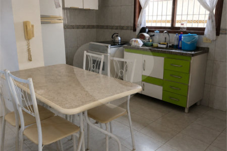 Casa à venda com 2 suítes, no condomínio Residencial Vitória Régia, Bertioga - SP