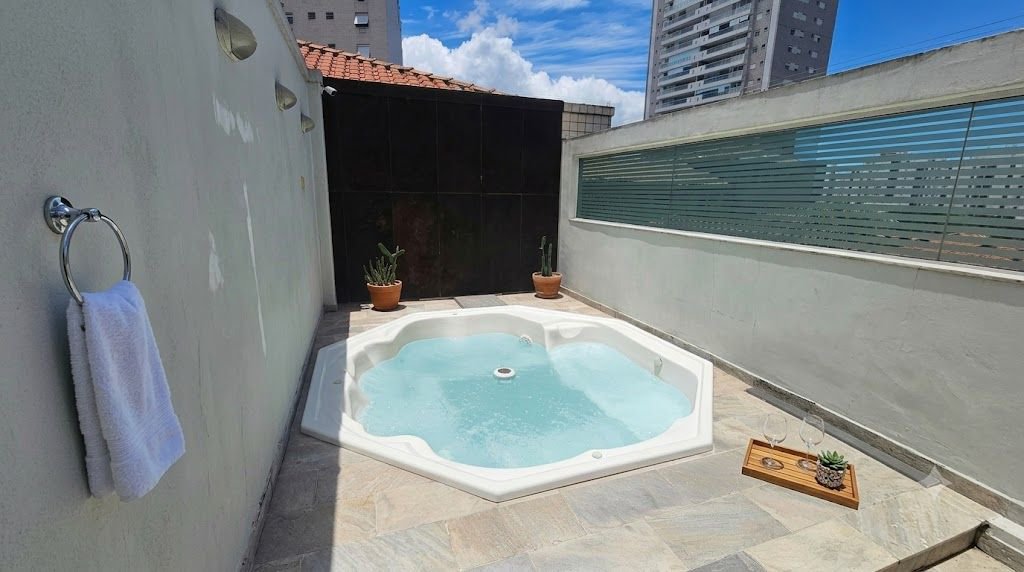 Casa com 4 dormitórios à venda, 166 m² por R$ 2.750.000,00 - Ponta da Praia - Santos/SP