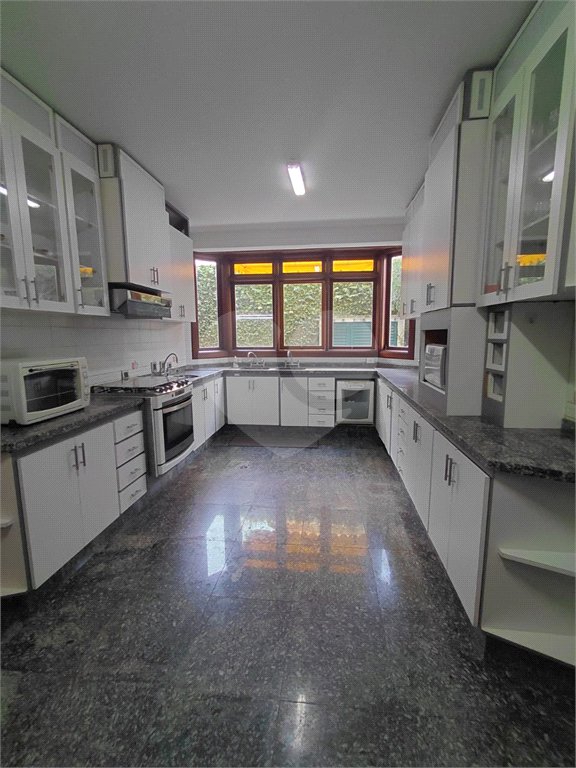 Casa à venda com 4 suítes no condomínio Ville Bourghese, São Paulo - SP