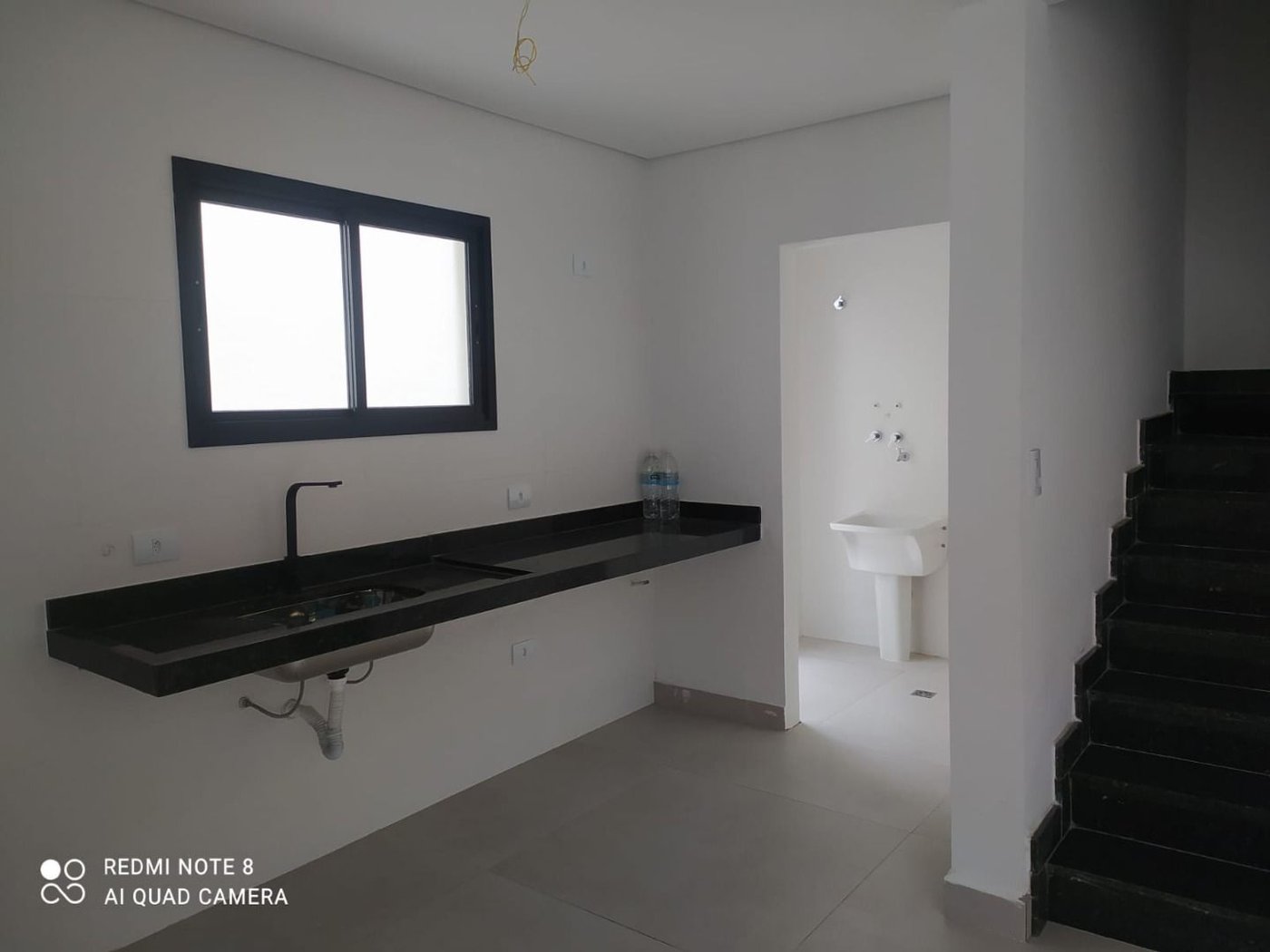 Sobrado com 3 dormitórios à venda, 107 m² por R$ 825.000,00 - Estuário - Santos/SP